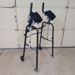 Walker with armrest