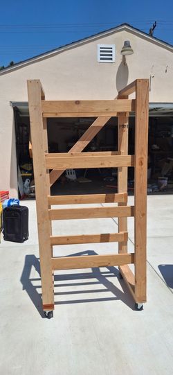 Black bin rack on wheels