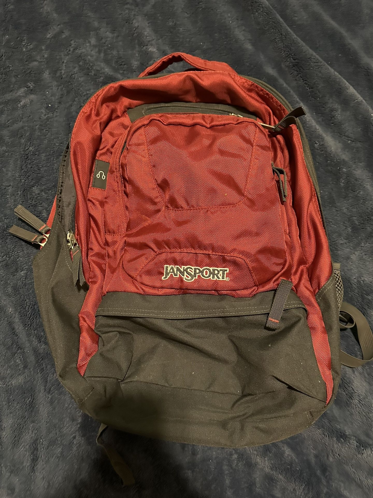 Red Jansport Backpack