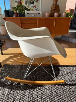 Modernica white fiberglass rocker Eames chair