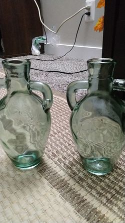 Vintage set of 2 green glass bottles great condition
