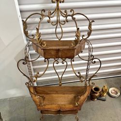 mid-century decorative wood and brass shelf.
