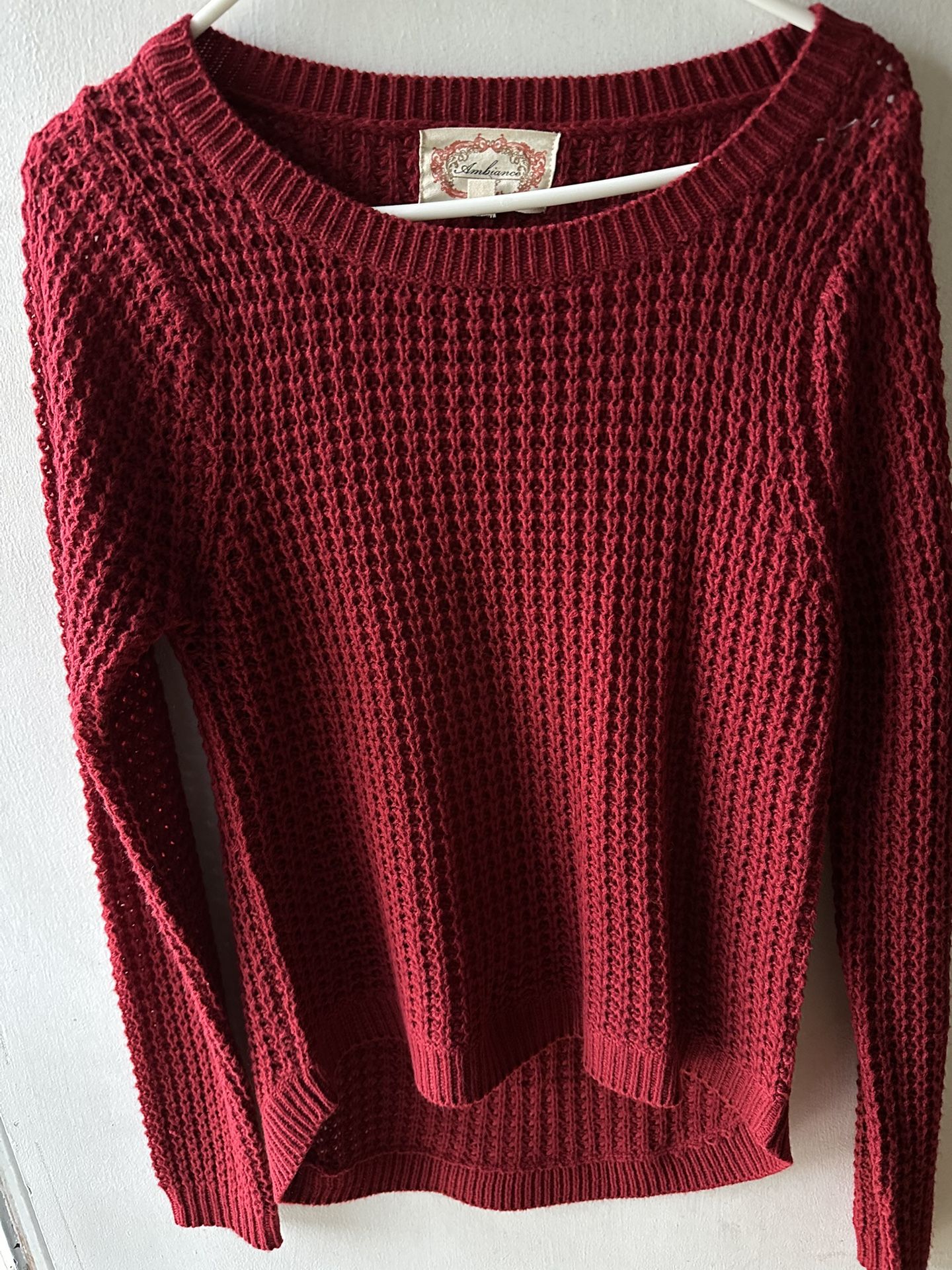 Women’s red knit sweater