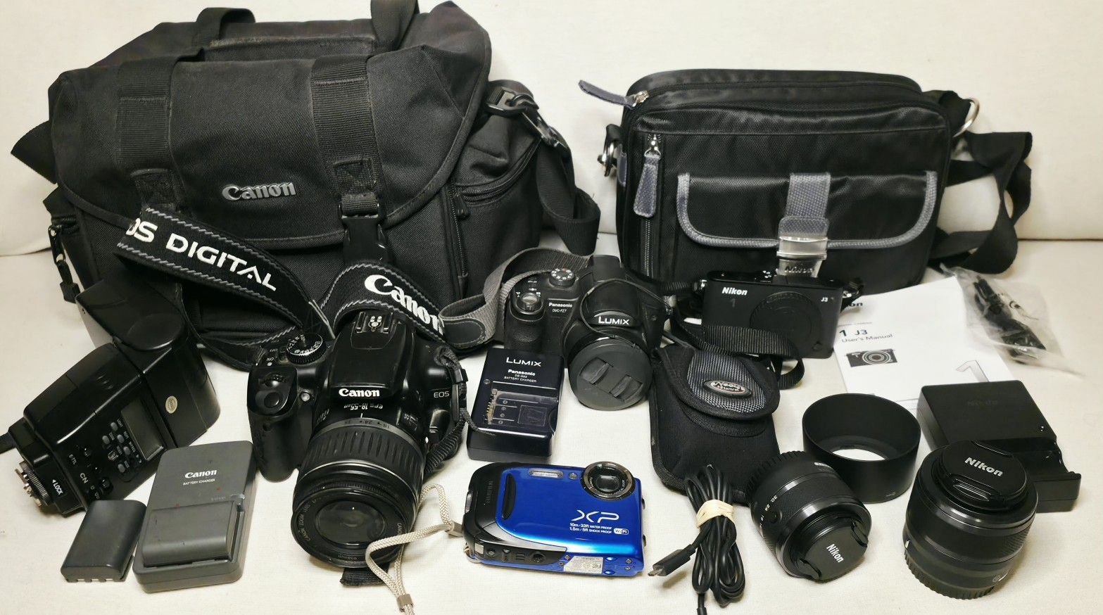 Lot Of 4 Cameras Nikon Canon Fujifilm Panasonic- All Work