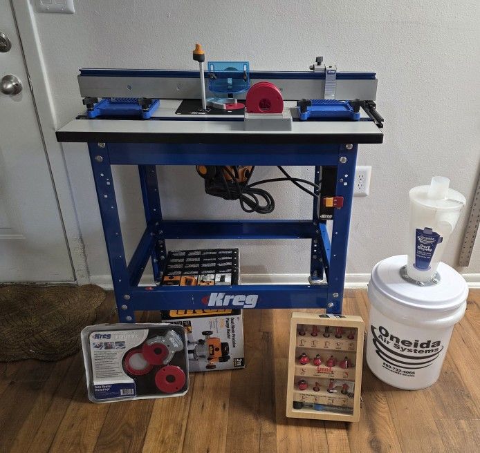 Complete Kreg router table system with accessories, Dust Deputy separator, router bit set, and more. Barely used, excellent condition. Everything work