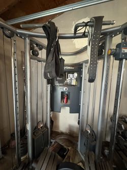 WORKOUT MACHINE WITH WEIGHTS 