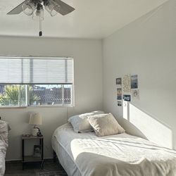 memory foam twin mattress (new!) + black metal bed frame)