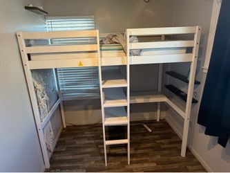 Twin bed over loft. With desk