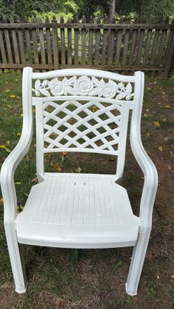 Out doors white vinyl chairs