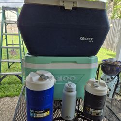 Nice Used Two Igloo Ice Coolers,  with accessories.