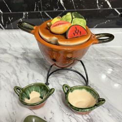 New vintage or antique Mexican-terracotta dishware,