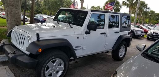 Jeep Wrangler unlimited sport S 2017! With only $5000 down payment I can get you approved.. we finance everyone. bad credit.. no credit.. repo..