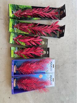 Aquarium silk and plastic red plants