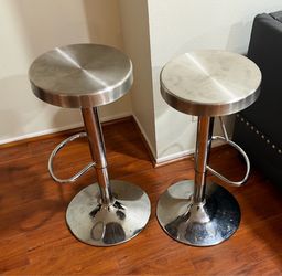 Two stainless steel bar stools