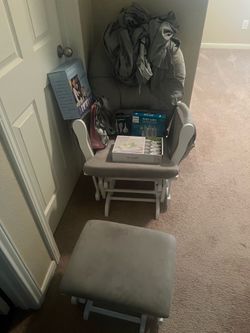Rocking chair + unused baby supplies