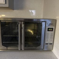 Oster Extra Large Single Pull French Door Silver Turbo Convection Toaster Oven
