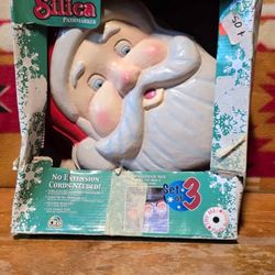 The Vintage Bright Star 3D Santa Face   with 3 faces ( battery operated ) Rare