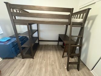 Twin loft bed with built in shelves and desk