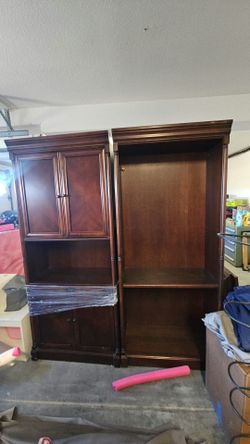 Tall bookcases or book shelves