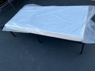 Twin mattress and frame $100