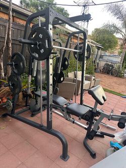 OLYMPIC SQUAT RACK SMITH MACHINE WITH OLYMPIC WEIGHTS