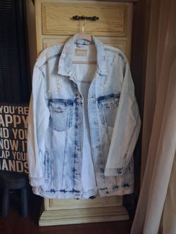 FREE PEOPLE faded and distressed denim jacket,  never worn tags attached Size Large to X-Large