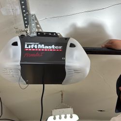 Garage Door Opener and Rails For Door