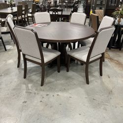 Seven Piece Round Dining Room Set