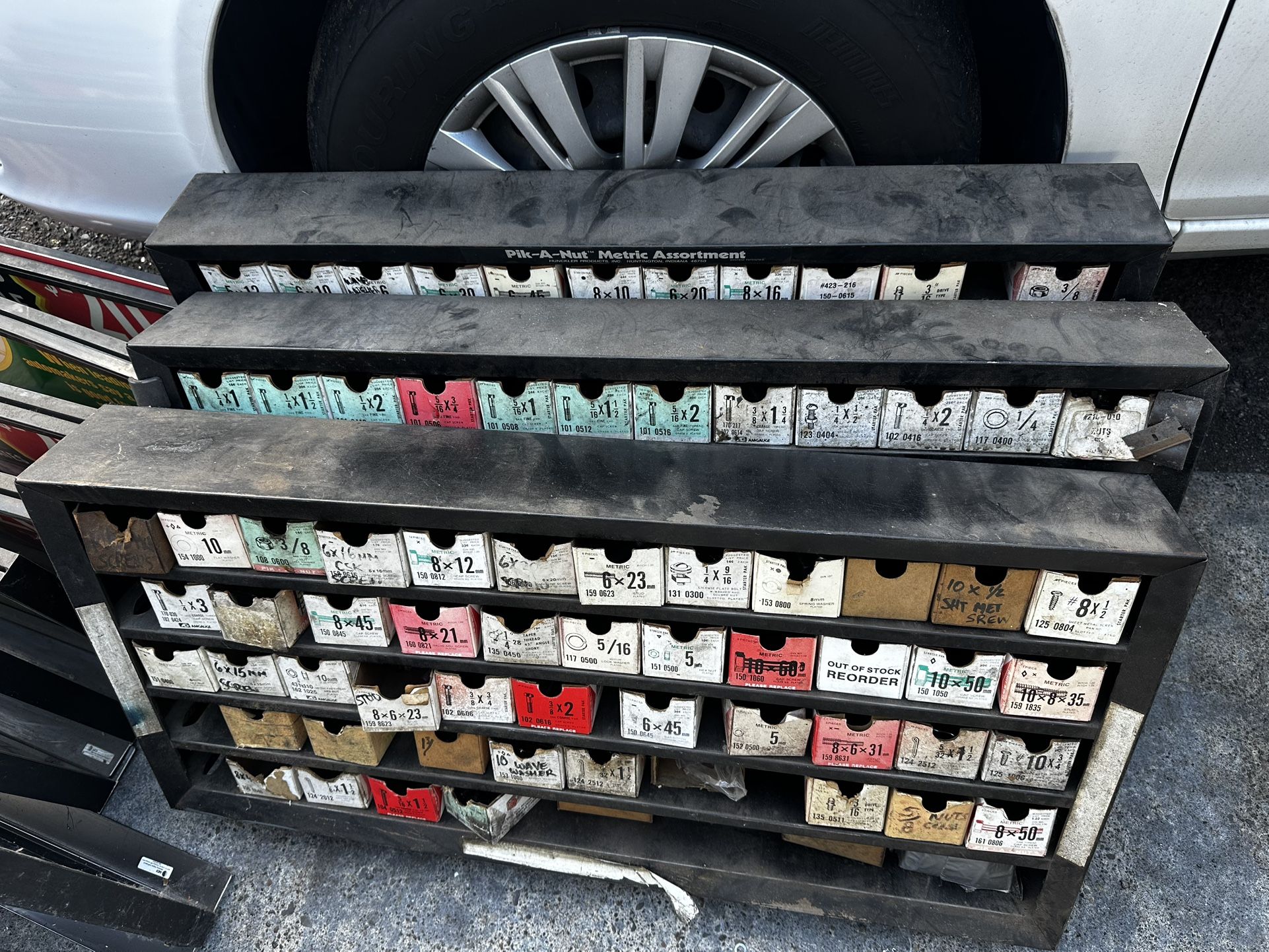 Parts Shelf With Nuts And Bolts