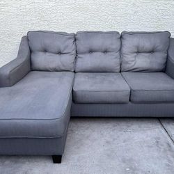 Gray Ahleys Furniture Sectional With Reversible Chaise(WILL DELIVER)