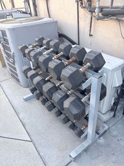 Ised- 2 sets Dumbbells w/racks.