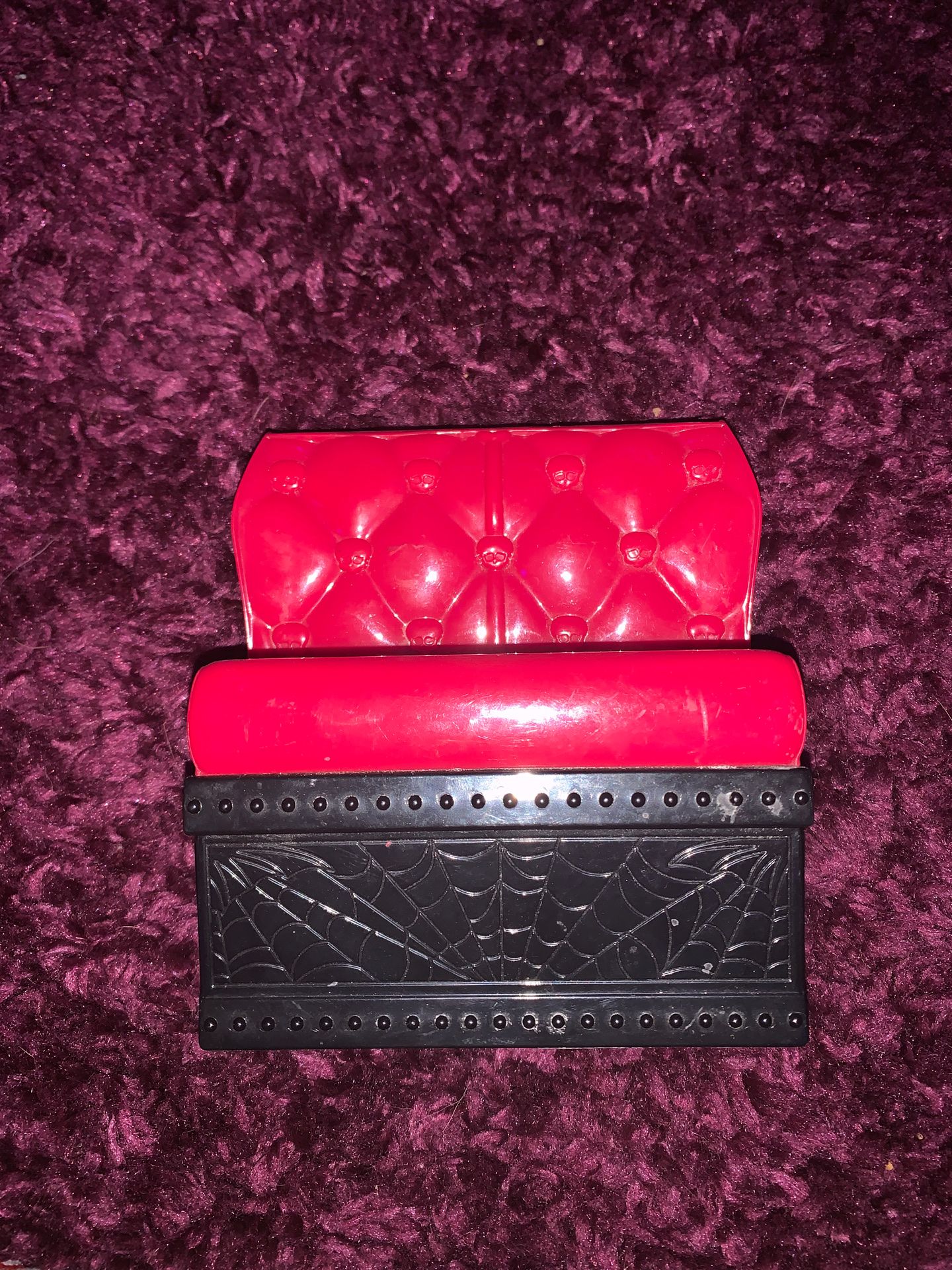 Plastic Black and red Barbie couch