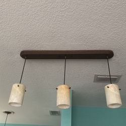 Triple Pendant And A Single Light