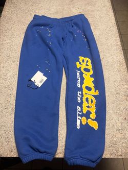 Blue and yellow Sp5der sweatpants