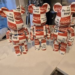 Bearbrick Atmos x Coca-Cola 1000% Checkerboard collectible figure. This limited-edition designer toy