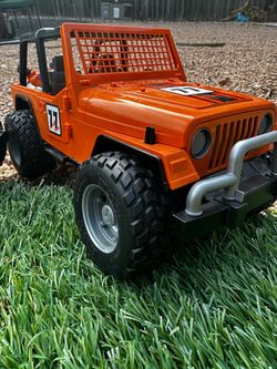 Bruder jeep cross country .orange. Great condition