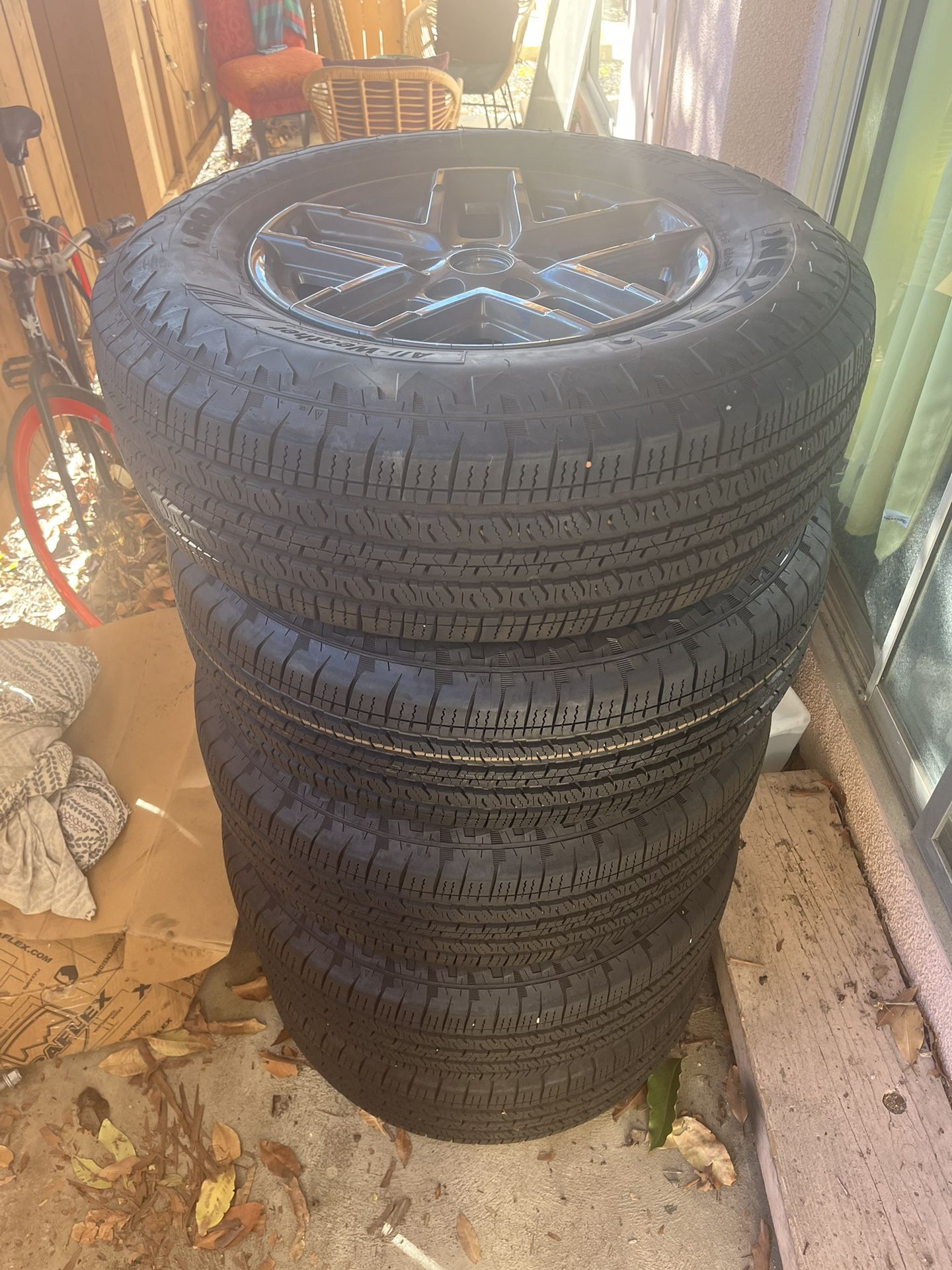 Jeep Wrangler Set of 5 Stock Wheels and Tires - 245/75R17 All Season Tires and 17x7.5 wheels