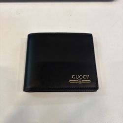 Authentic Gucci Black Leather Bi-Fold Wallet – Gold Logo