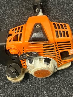 Stihl KM- 94R with hedge trimmer attachment