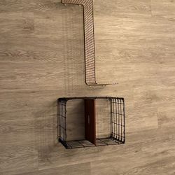 Ikea shelves - one gold, one black 