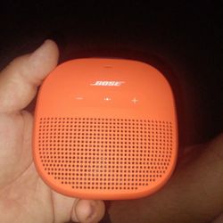 Orange Bose Hand Held Speaker 