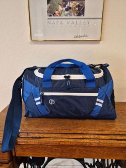 Protege 18-inch blue and white duffel bag
