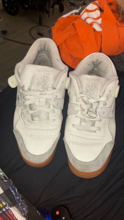 Reeboks, white pair of shoes size 9 1/2