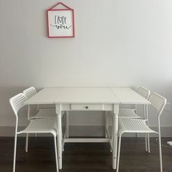 SELLING my IKEA kitchen table!! 2 Leafs on both sides to make flexible for spaces! $200