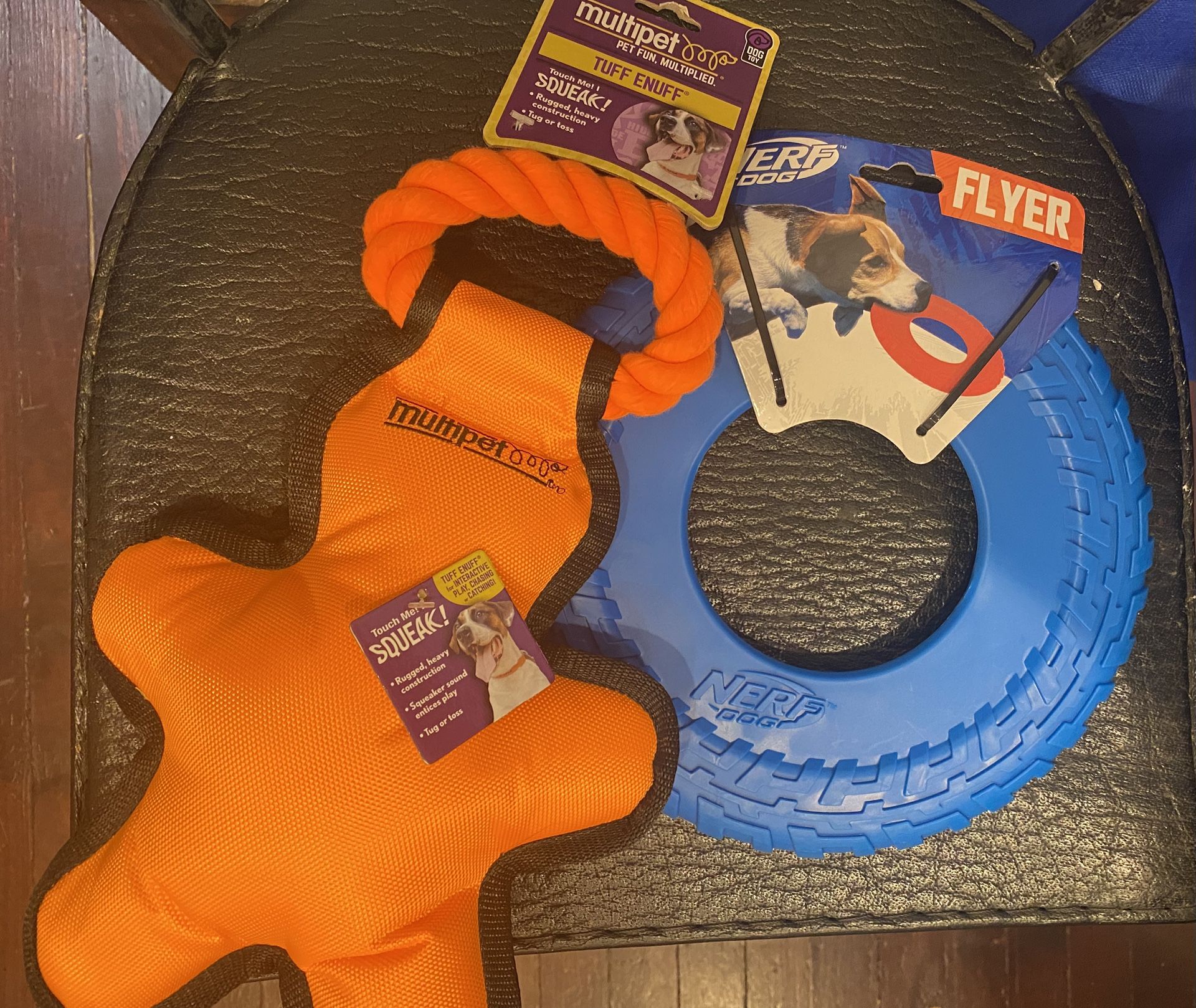 $10 -(2 ) Brand New !!!- Dog/pet Toys- Orange Squeaky Tug Toy + Blue Nerf Flyer Wheel/disc