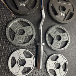 NEW Olympic Equipment Curl Bar of 20# with Cooper Bearings and Plates 2X35s, 2X25s, 2X10s and 2X5s pounds. Brute 170#