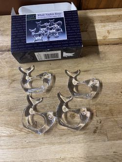 set of four clear acrylic whale-shaped napkin rings