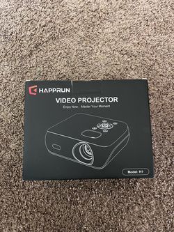 Brand New Projector. Built in speaker.