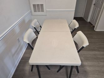 Lifetime  table with 4 Lifetime brand chairs