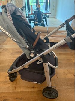 Uppa baby stroller and attachment and pouch
